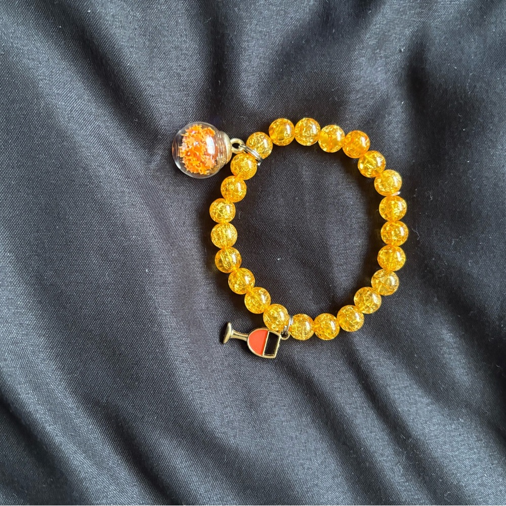 Yellow Beaded Bracelet with Charms